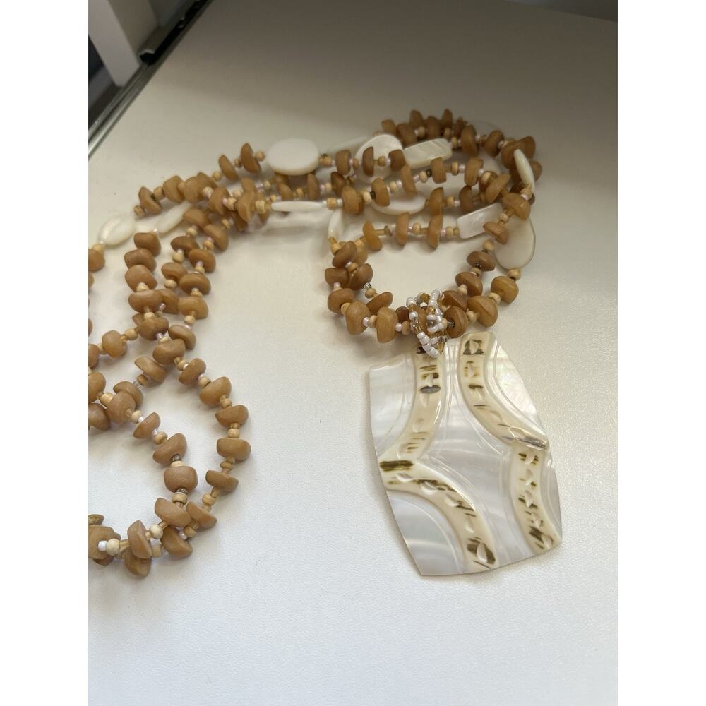 Vintage Mother of Pearl Necklace 36” Long Brown Beads MOP Pendant Carved